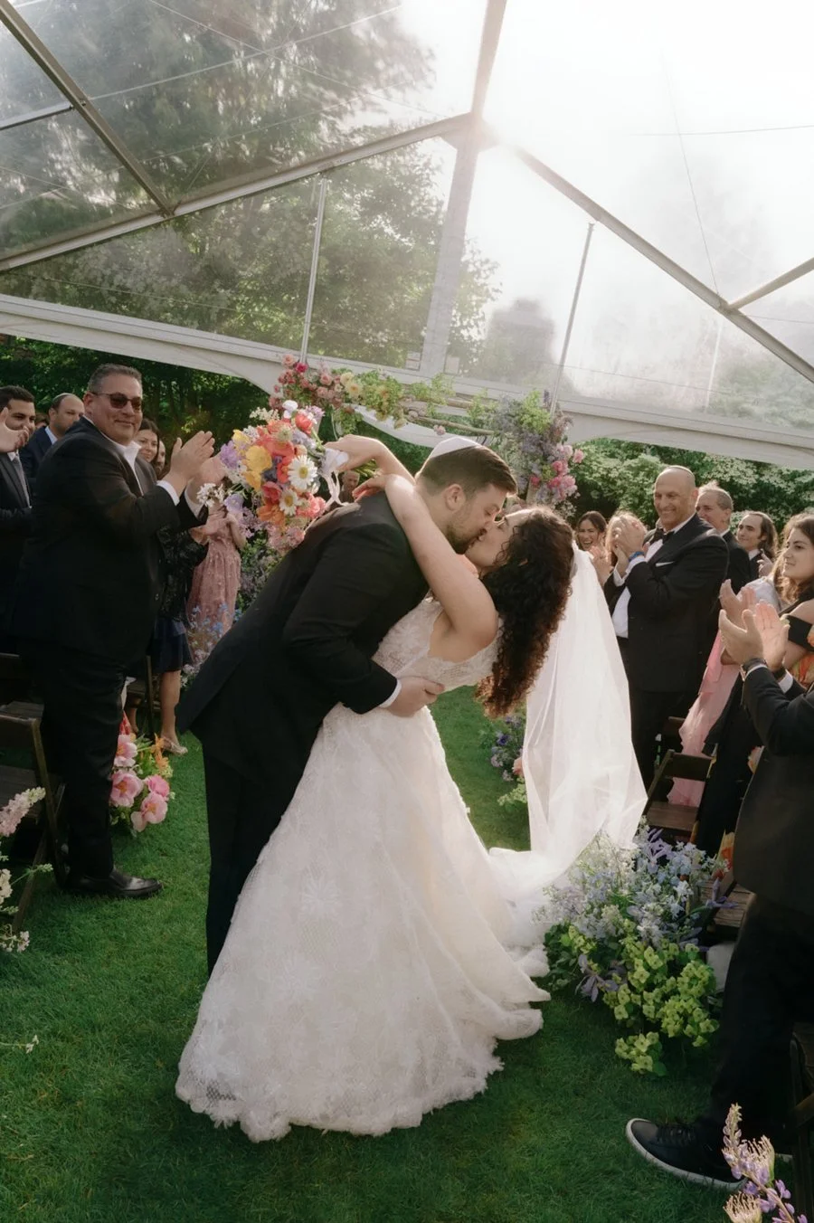 bride-groom-kiss-aisle
